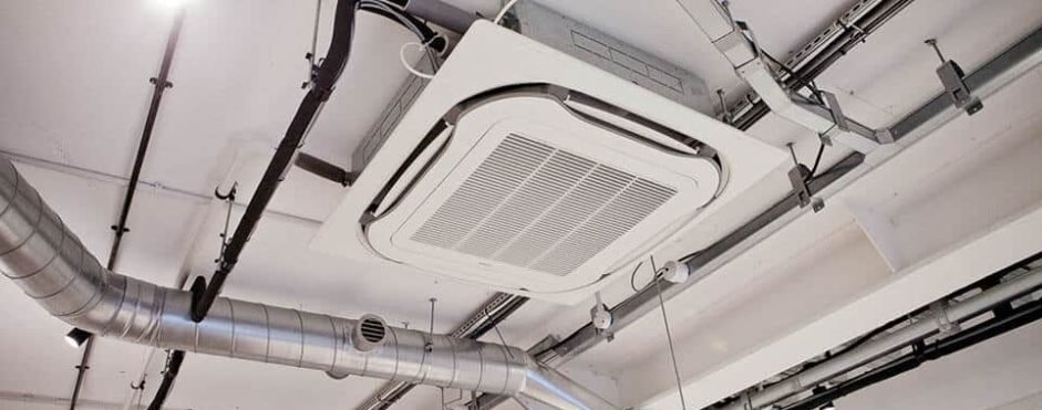 Newly installed ceiling cassette unit with exposed ductwork