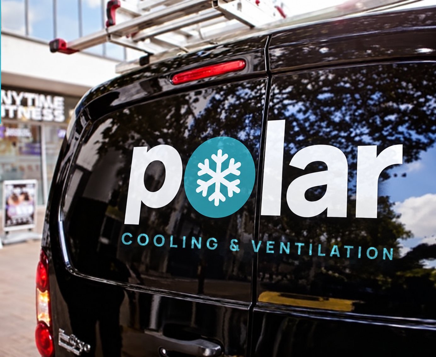 Black Polar van with ladders on the roof rack